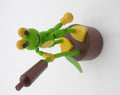 Grenouille en bois se démentibulant