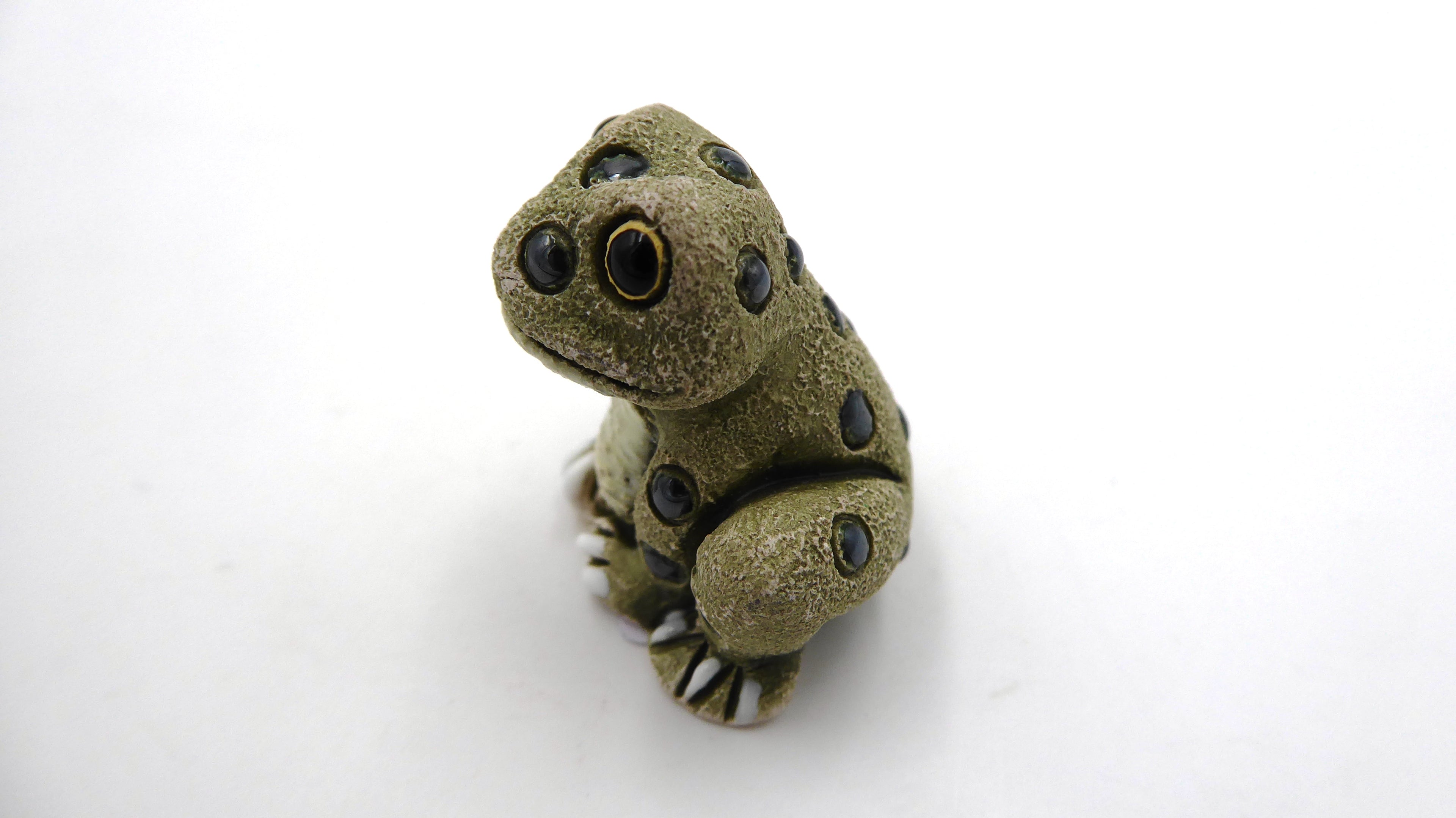 Petite grenouille incrustée venant du Pérou