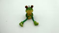 Rigolote petite grenouille en bois peint avec jambes mobiles