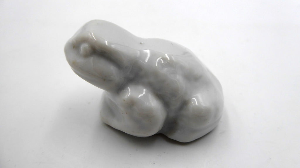 Petite grenouille en céramique blanche