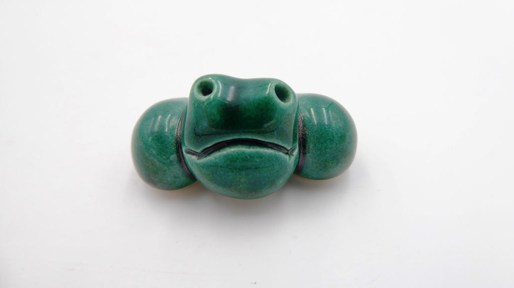 Petite grenouille en céramique verte