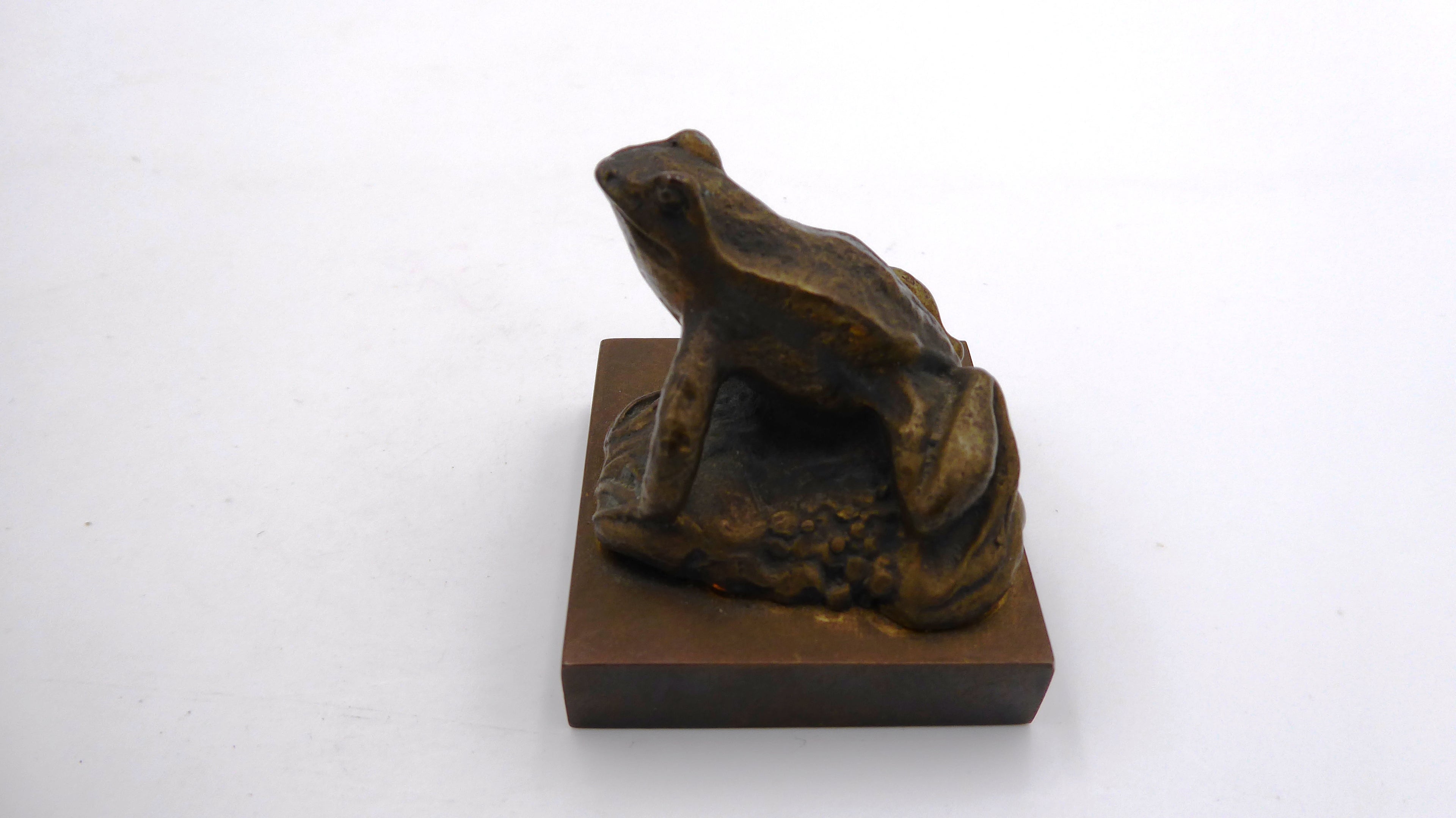 Petit bronze ancien servant de presse papier malgré sa taille