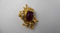 Broche grenouille doré pierre rouge