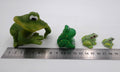 Lot de quatre sujets grenouilles variées