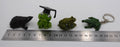 Lot de quatre sujets grenouilles variées