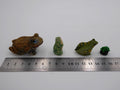 Lot de quatre sujets grenouilles variées