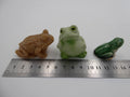 Lot de trois sujets grenouilles variés