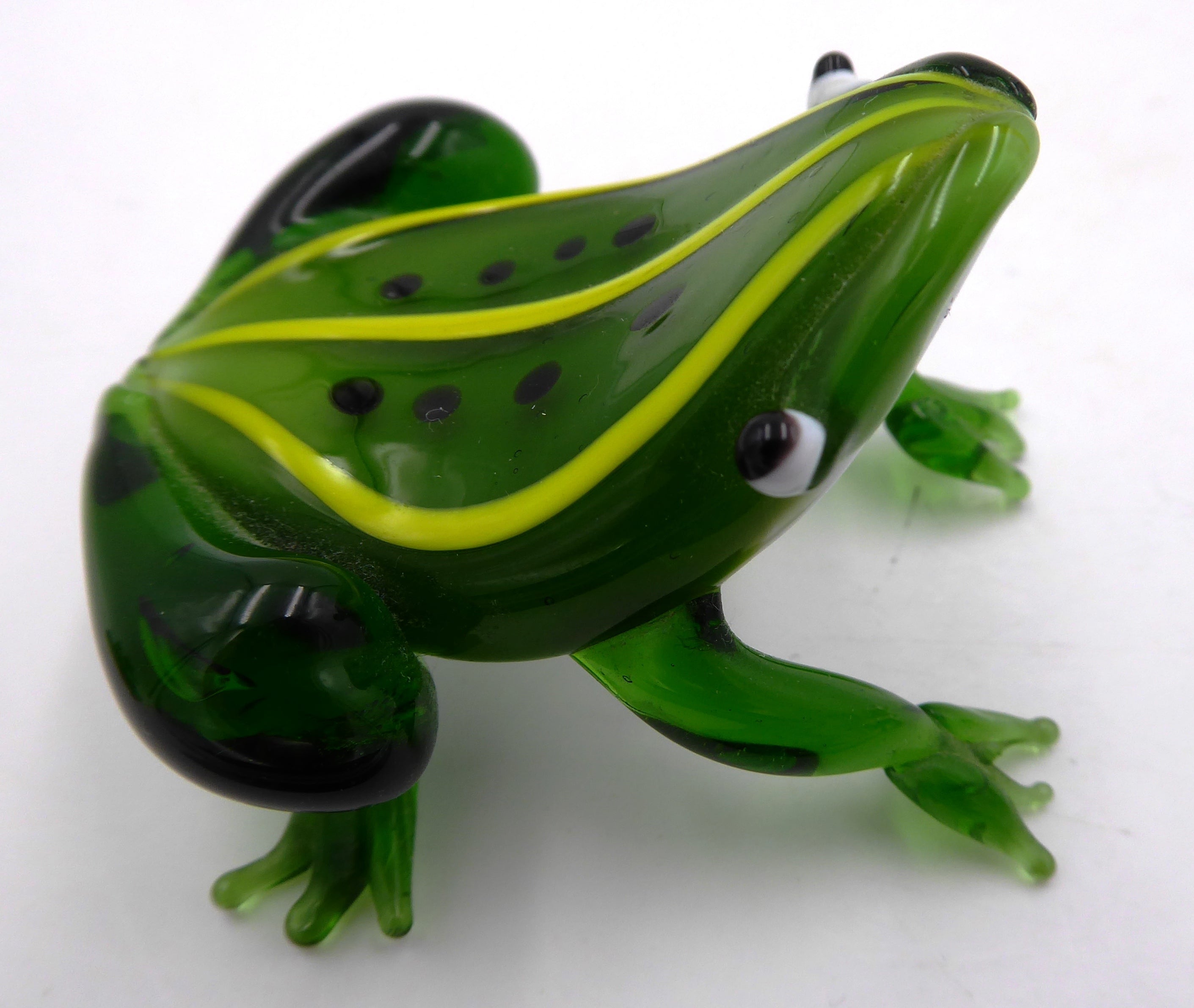 Groupe de quatre grenouilles en verre soufflé