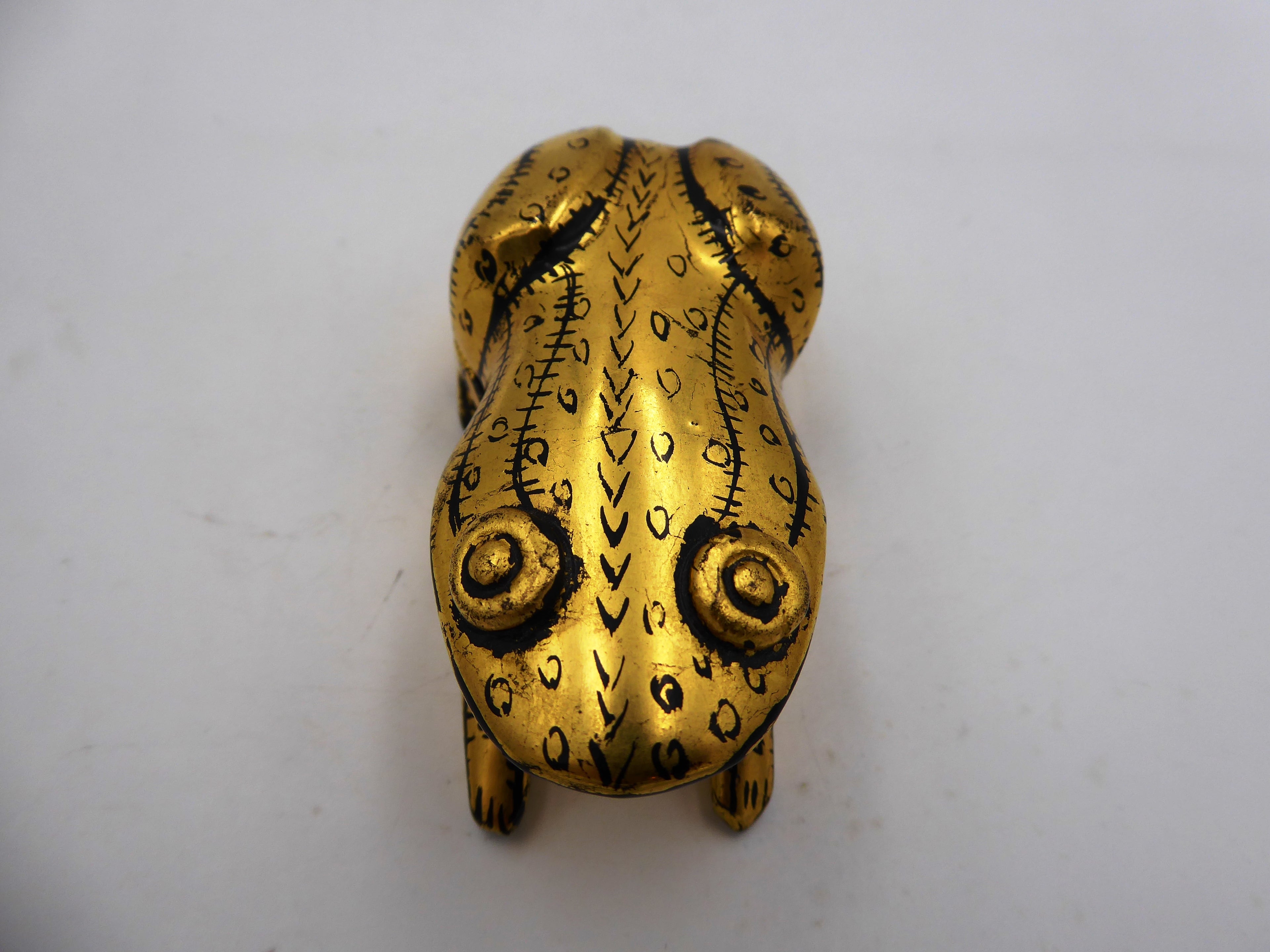 Petite boite à bijoux dorée motifs noirs