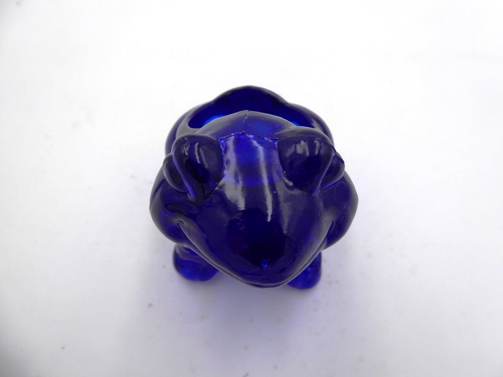 Petit pot en verre bleu foncé