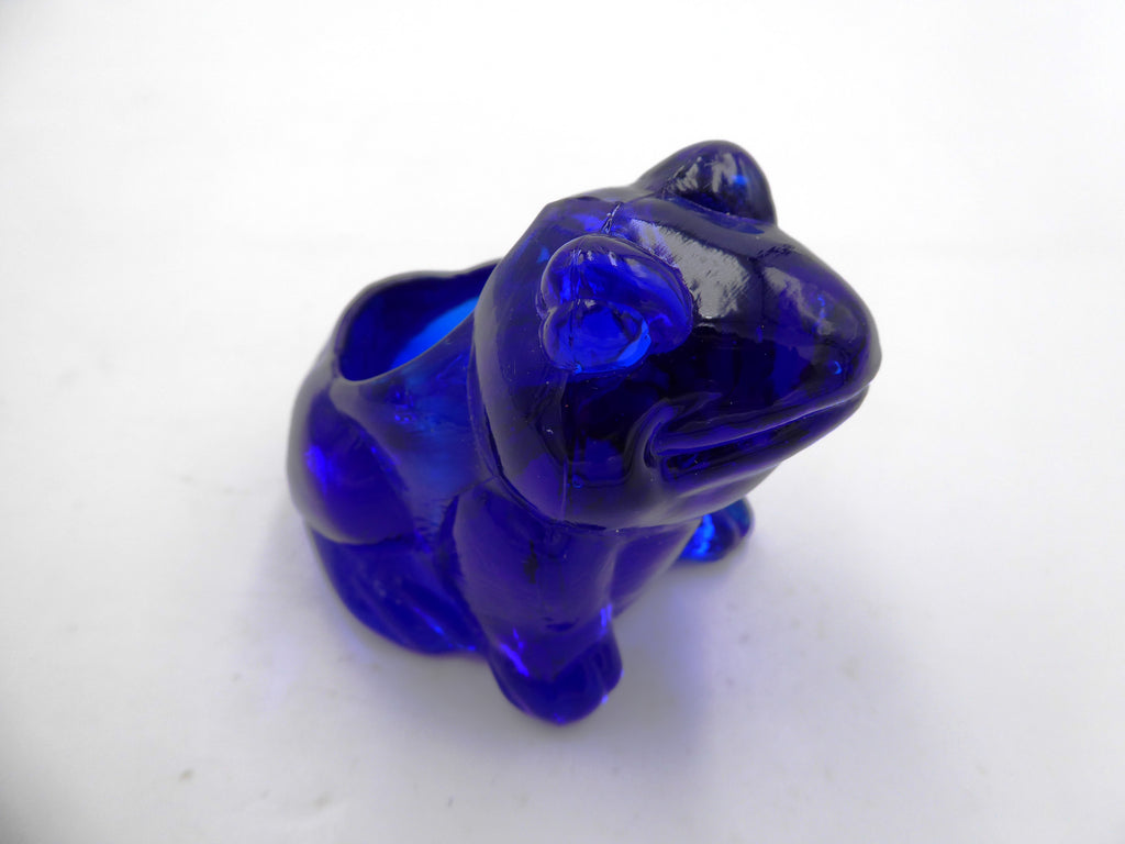 Petit pot en verre bleu foncé