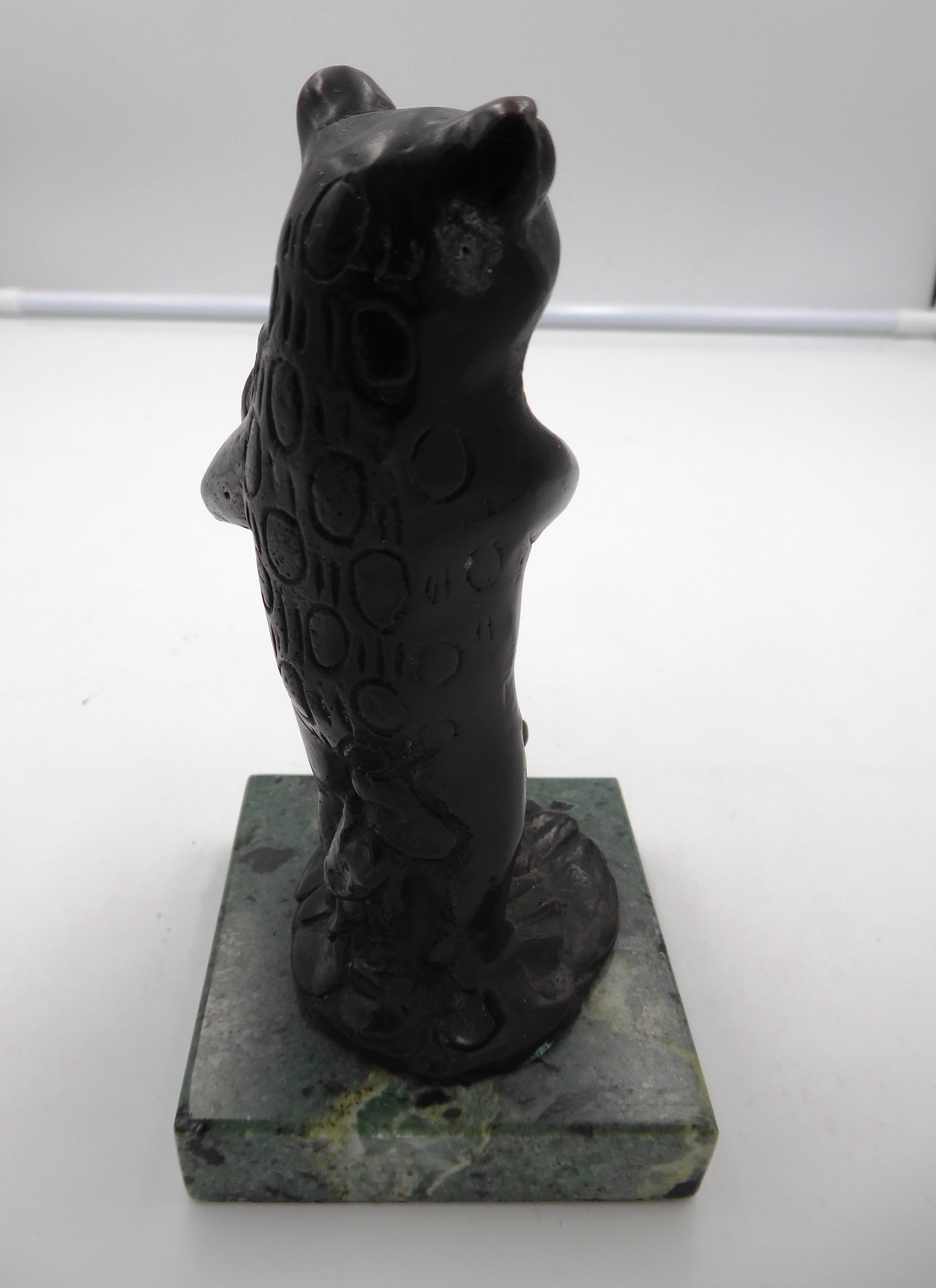 Statue bronze (Bougeoir) sur marbre vert