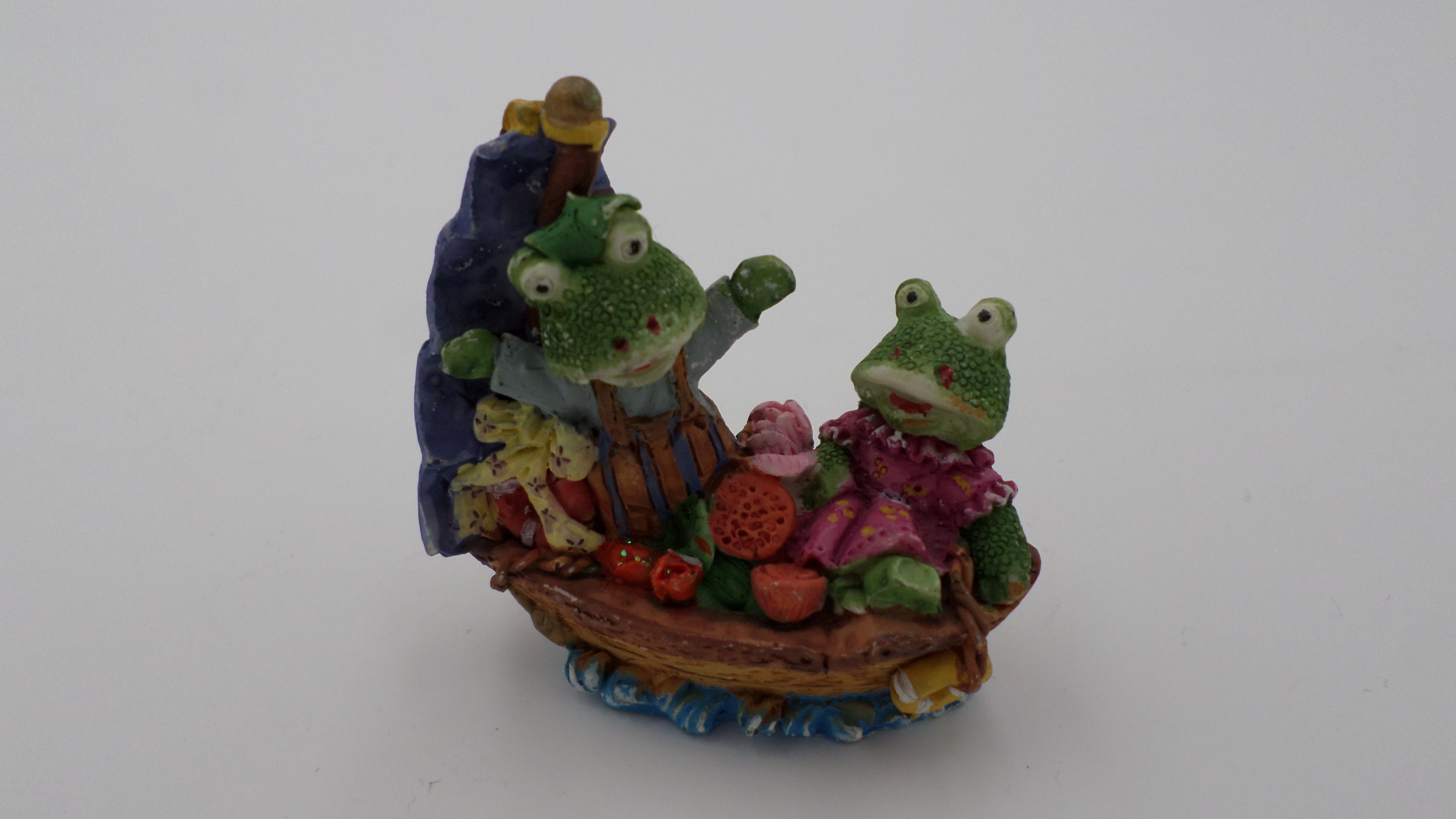 Famille grenouille sur bateau