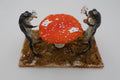 Véritable grenouilles jouant au cartes