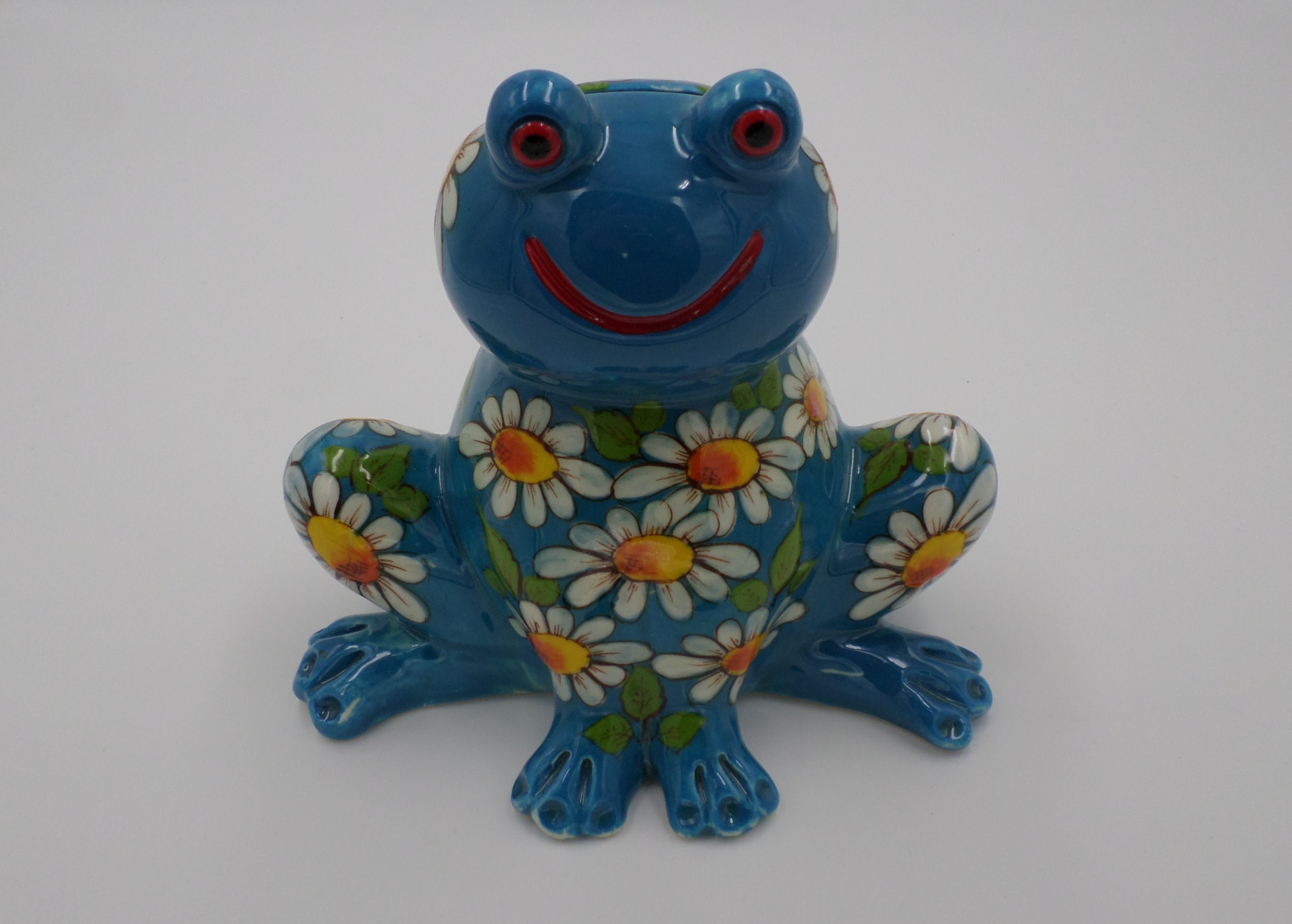 Tirelire grenouille aux marguerites couleur bleu en ceramique