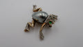 Broche plaqué or Alfred PHILIPPE (Vers 1930) série CROW TRIFARI PAT PEND
