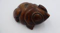 Énorme grenouille en bois sculpté