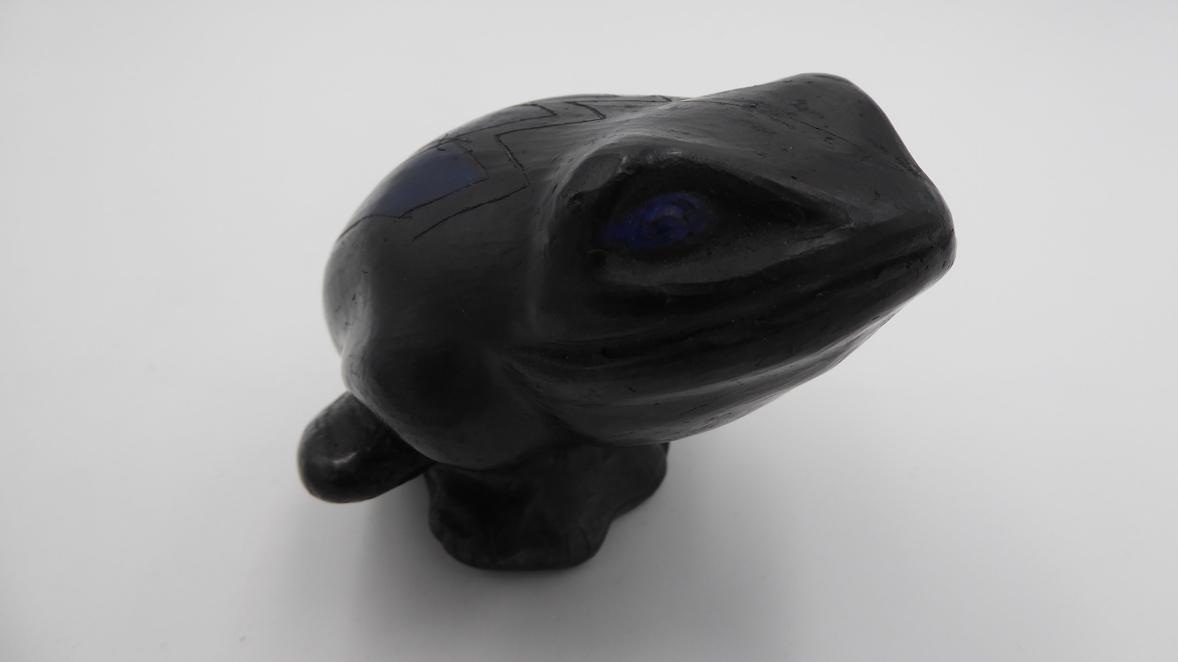 Vieille grenouille en céramique noire et bleu
