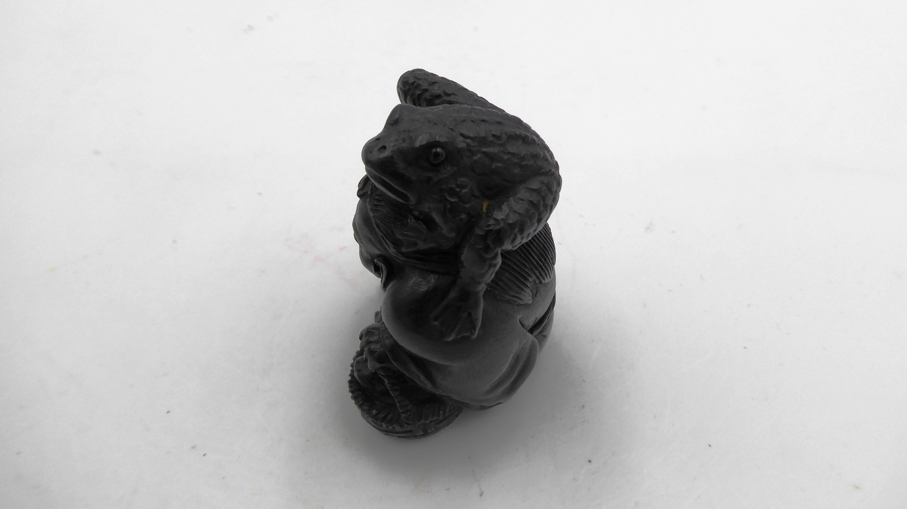 Metsuke signé Grenouille sur un homme