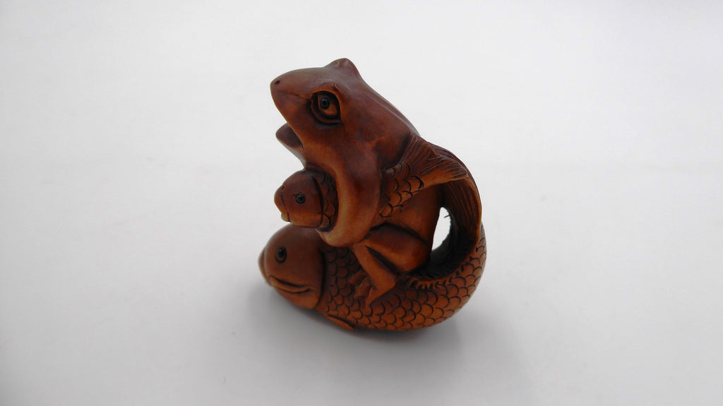 Metsuke signé Grenouille sur un poisson