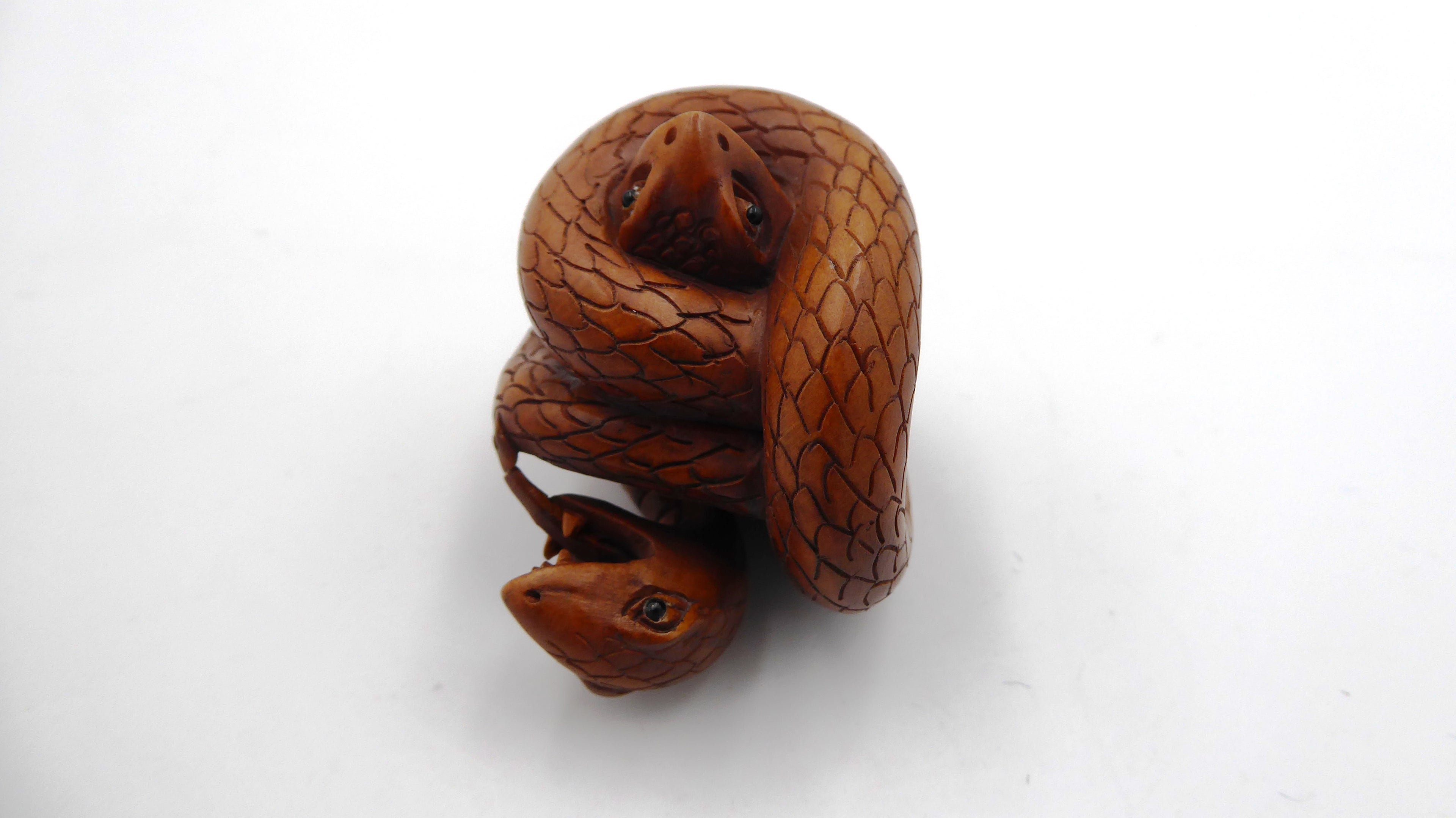 Metsuke signé Serpent étranglant une grenouille