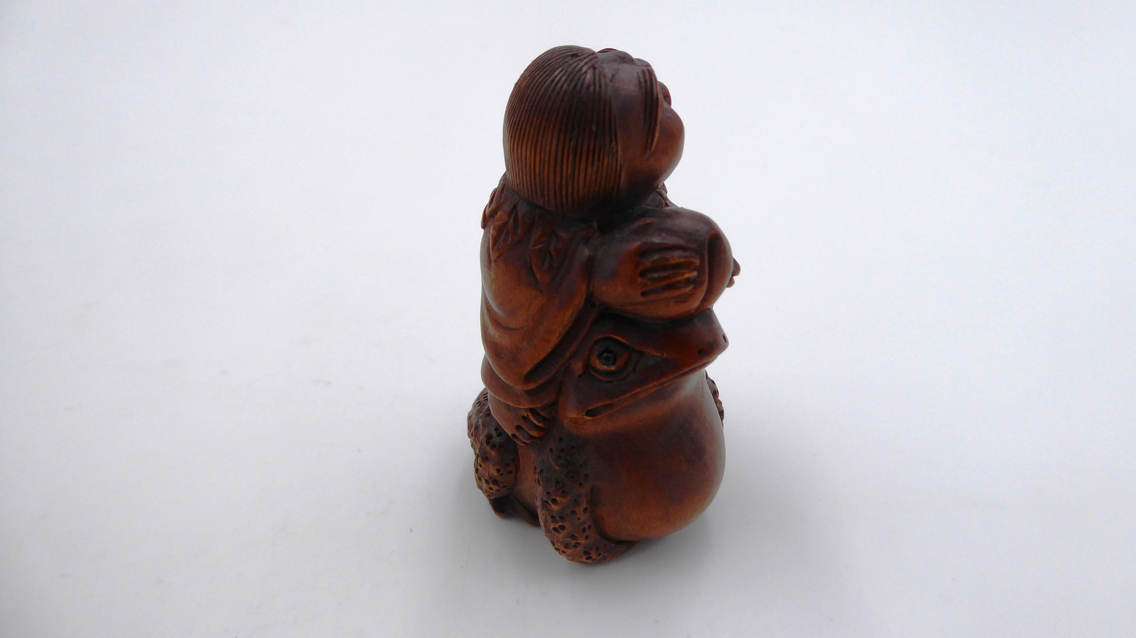 Metsuke Homme sur une grenouille