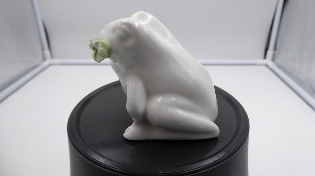 Salière céramique blanche Grenouille avec une fleur dans la bouche