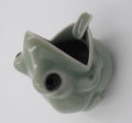 Grenouille en céramique tirant la langue