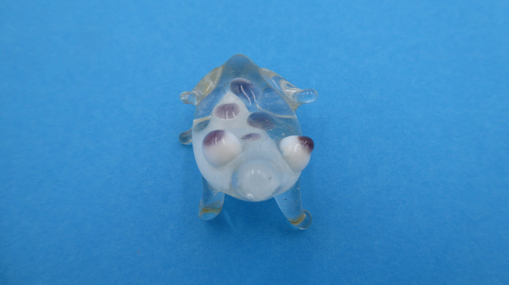 Petite grenouille en verre soufflé intérieur blanc et yeux mauves