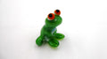 Petite grenouille en verre soufflé aux yeux orangés