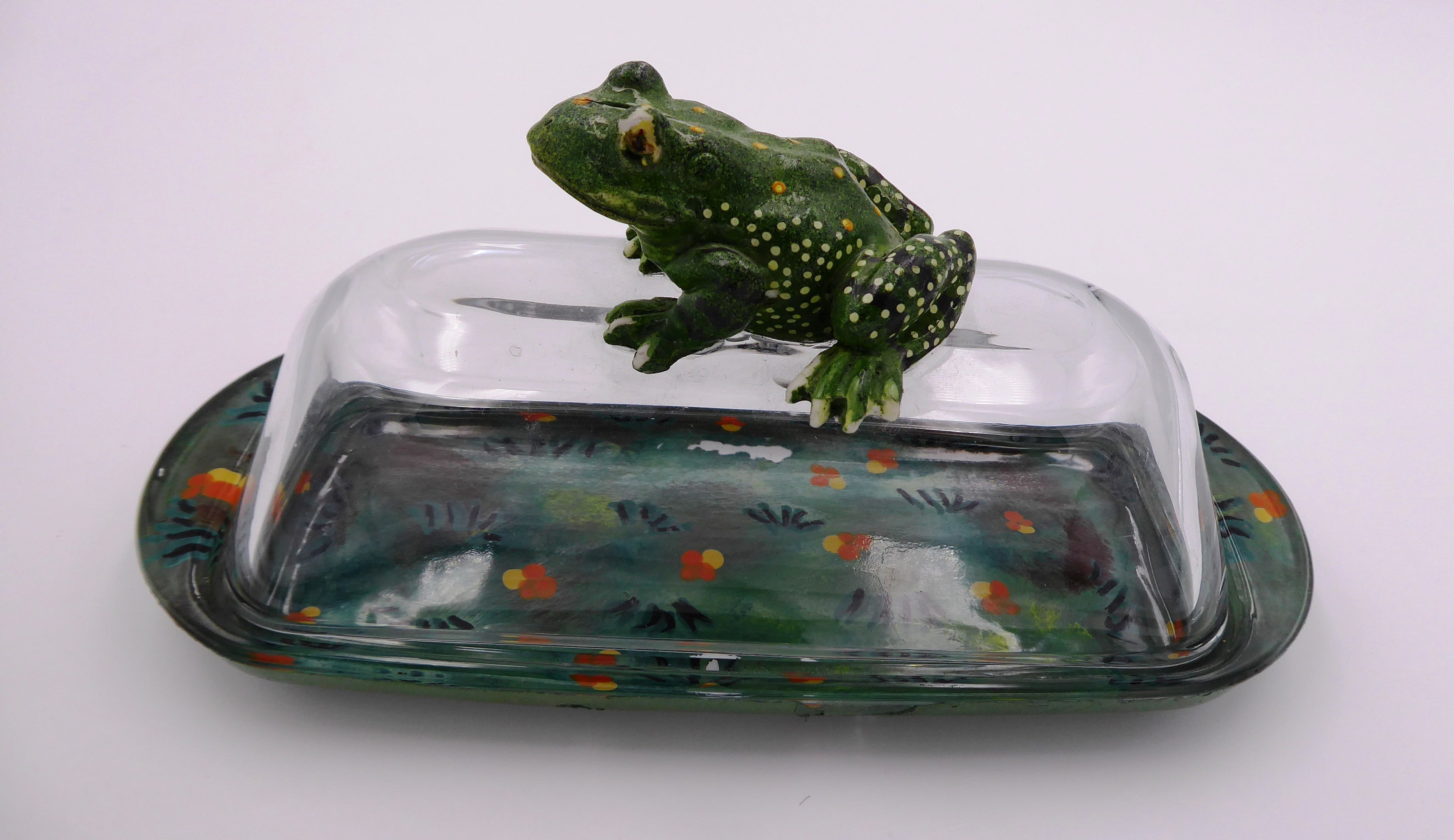 Ancien beurrier en verre peint