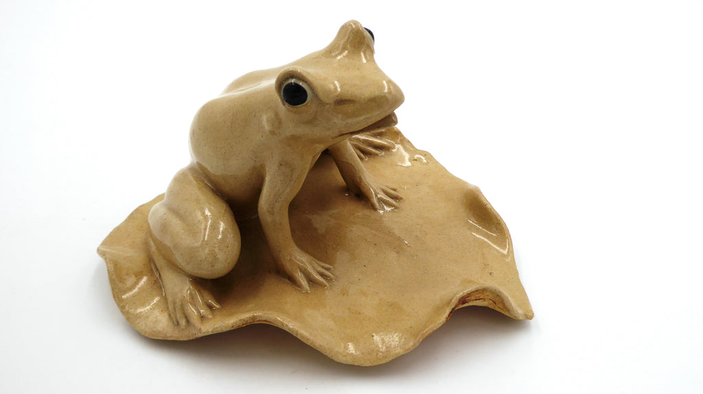 Céramique chinoise grenouille beige aux yeux noirs